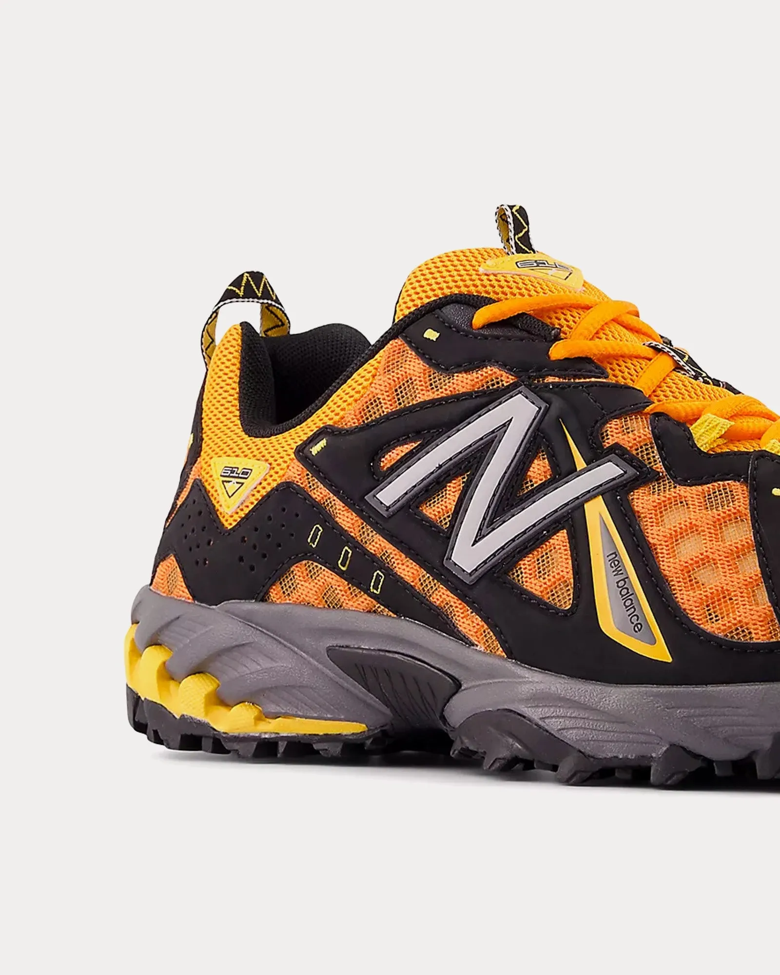 610v1 Sun Glow / Black / Gold Fever Low Top Sneakers